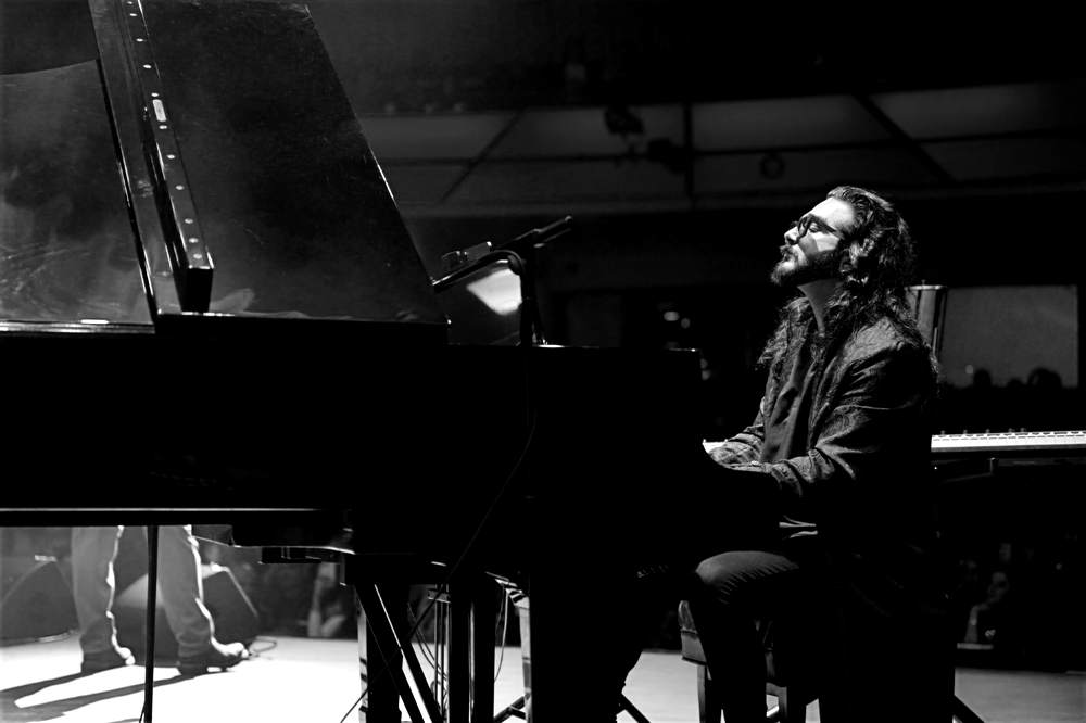 Behrooz Paygan at the piano on stage